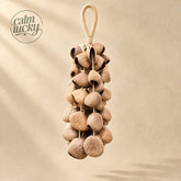 Handmade dark black-brown seed wind chime hanging, handheld natural chime