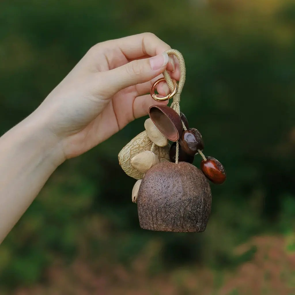 Deep Echo seed charm — deep-toned natural seed bell for keys