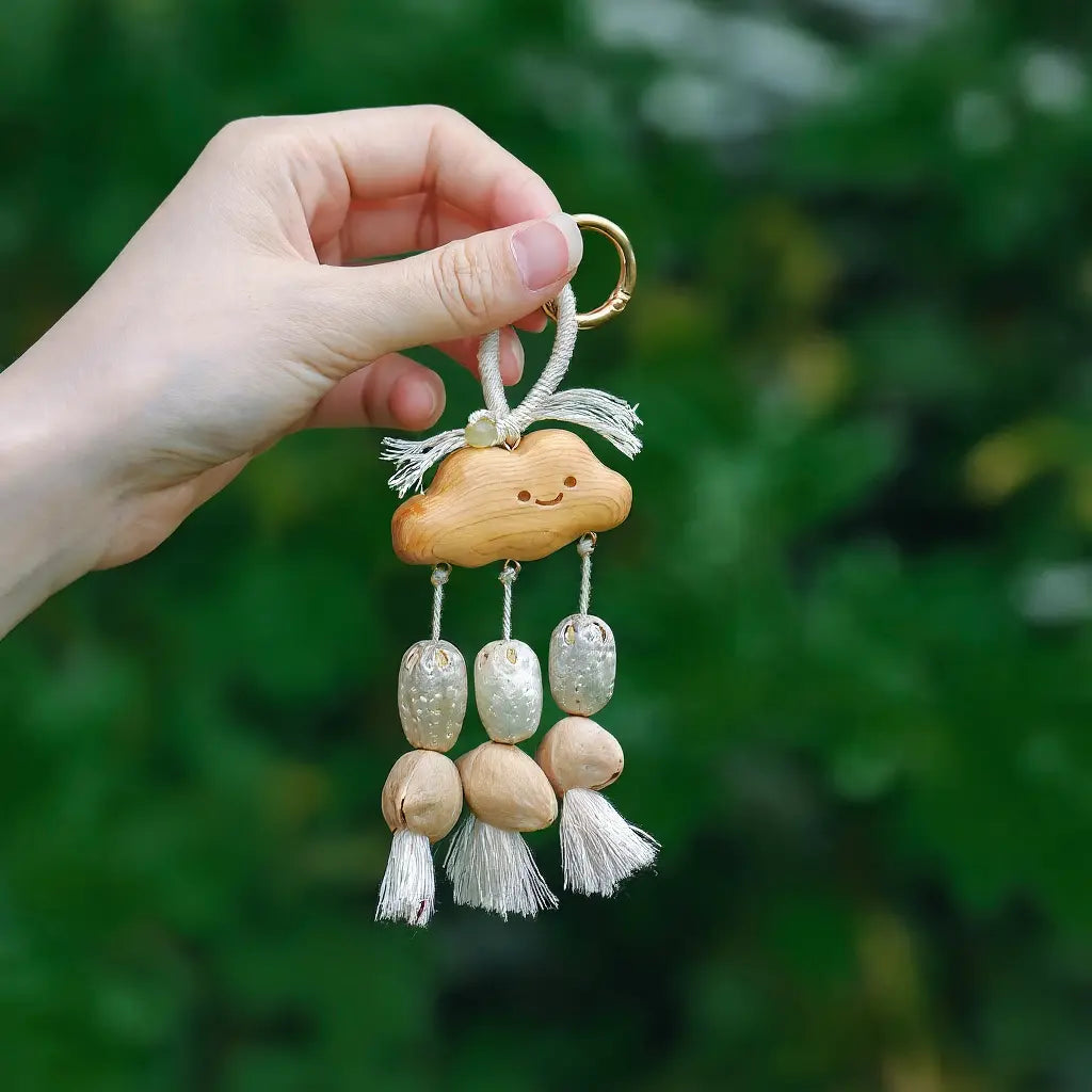 Cloud Tassel seed charm — white tassel seed bell keychain