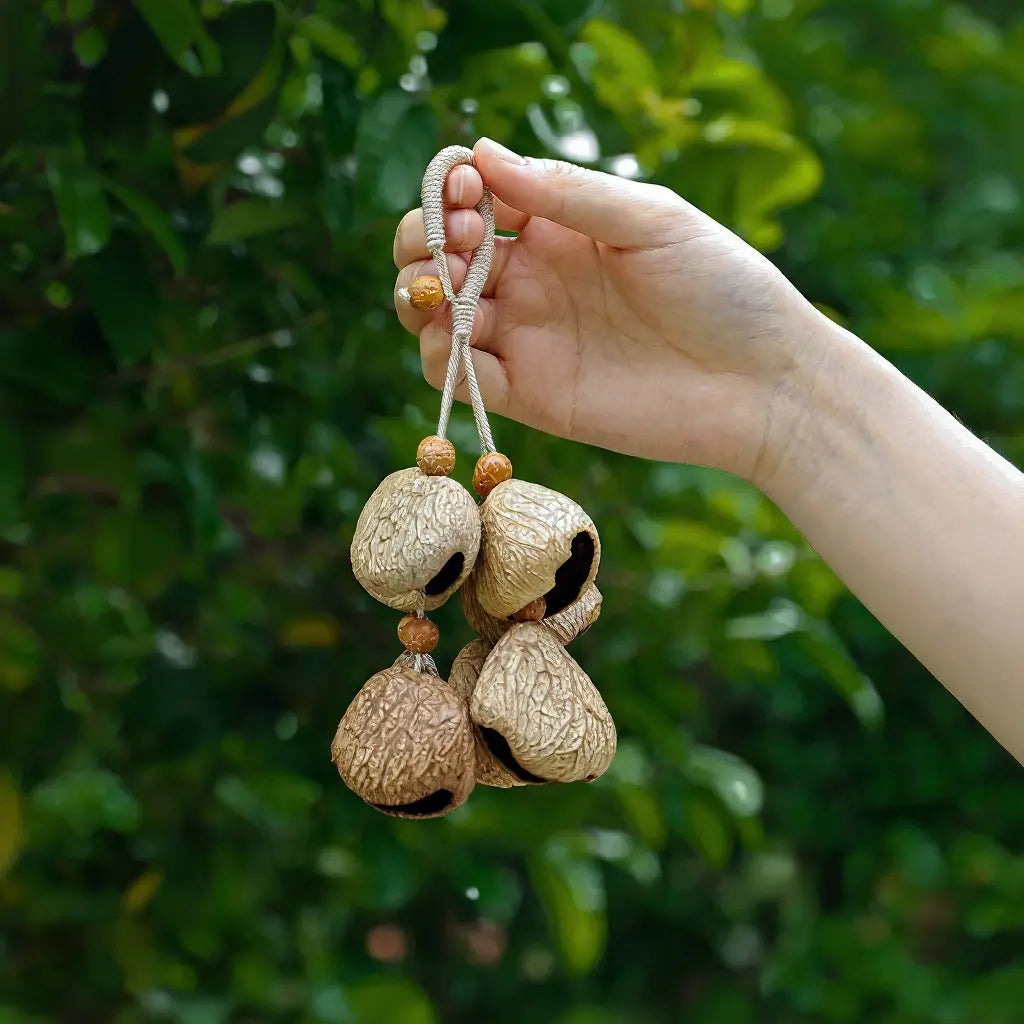 Warm Sun seed charm — warm orange natural seed sun bag charm