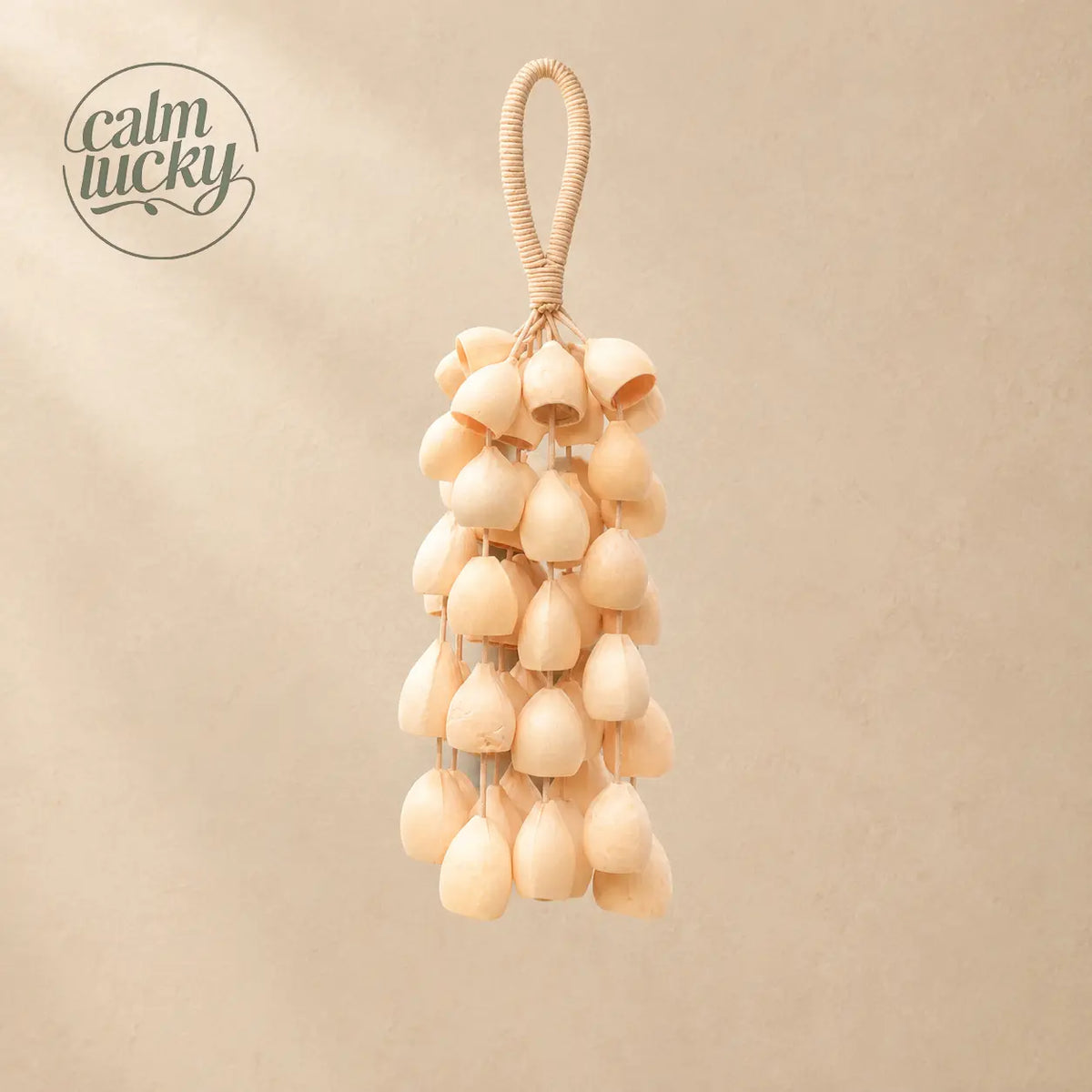 Handmade pale cream smooth seed wind chime hanging, handheld natural chime