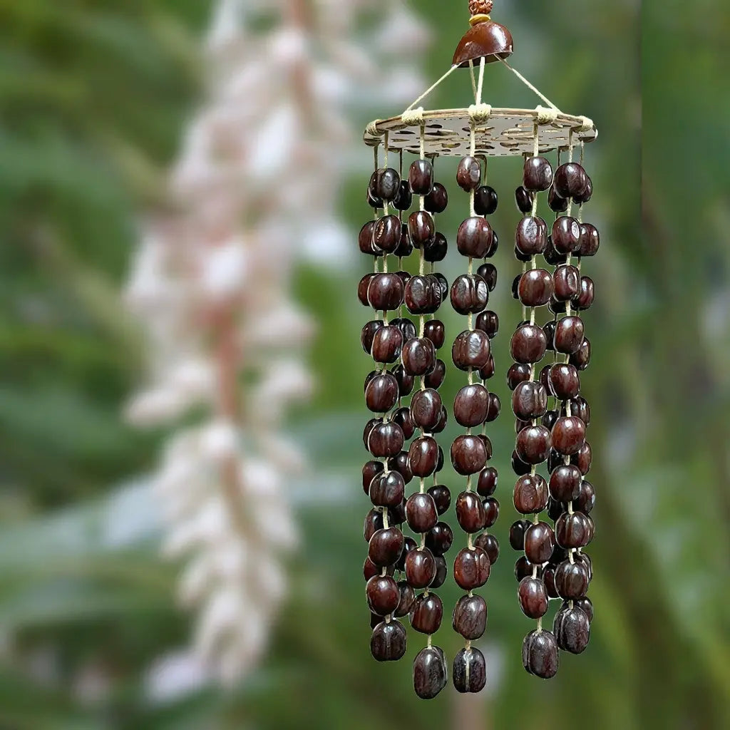 Cardamom Cloud wind chime with dark and ivory two-tone shell strands