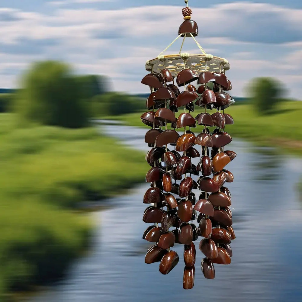 Deep Current extra-long wind chime with dense dark fruit shell cascade