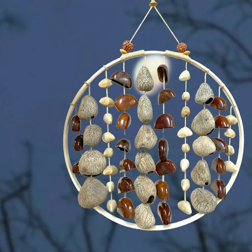Harvest Moon fruit shell wind chime with cream and dark natural shells