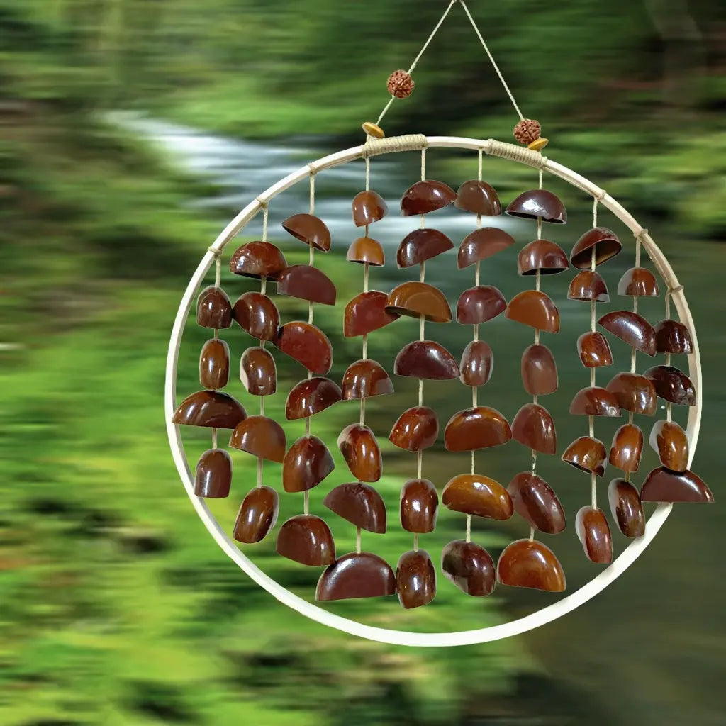 Riverstone Red fruit shell wind chime with polished reddish half-shells