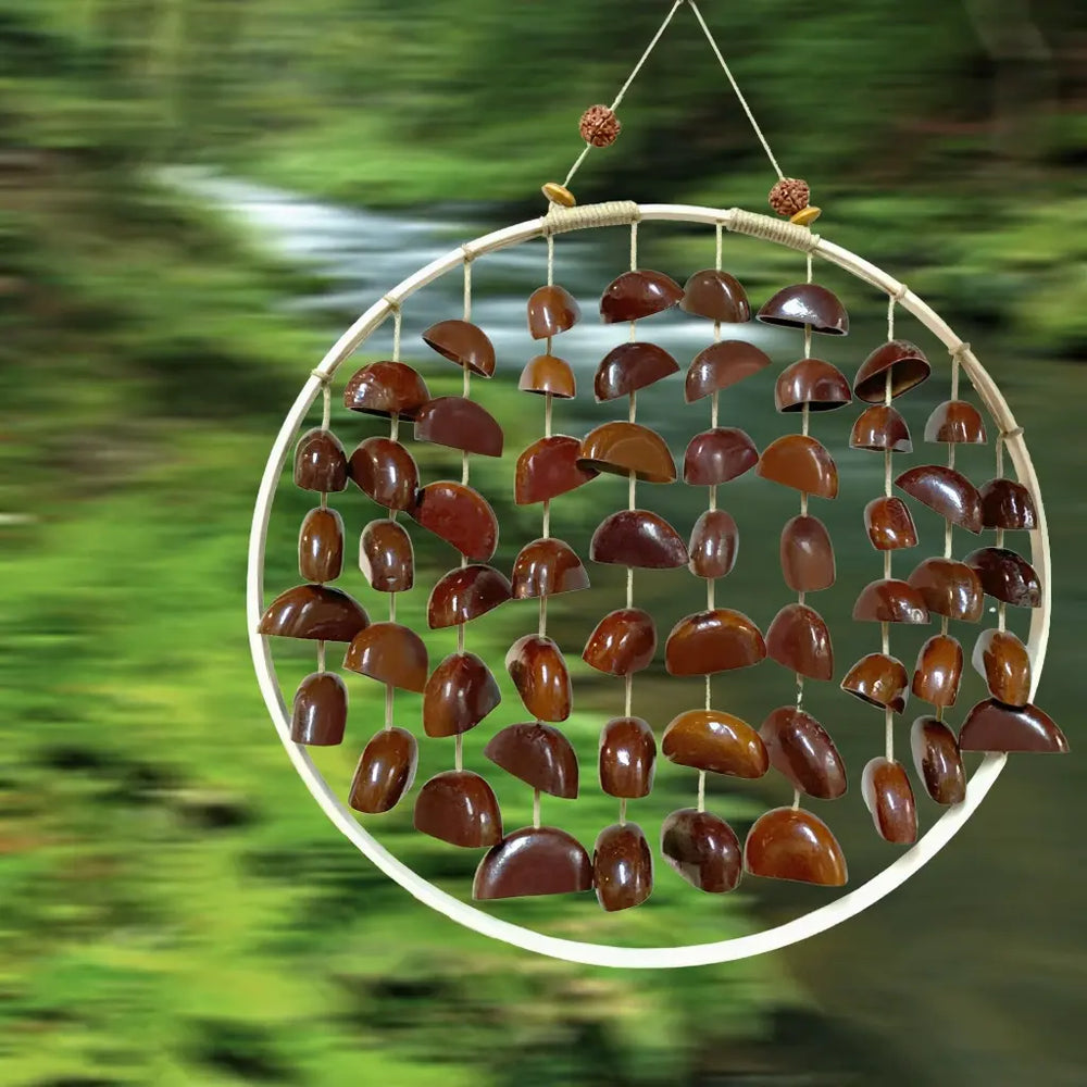 Riverstone Red fruit shell wind chime with polished reddish half-shells