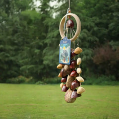 Spring Falls fruit shell wind chime with multicolor natural shells on a woven ring