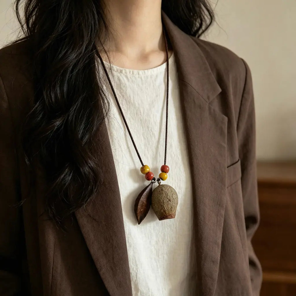 Pine Breeze natural seed necklace — (variant image missing on cdn — name from supplier listing, verify visually), handmade boho pendant on adjustable cord